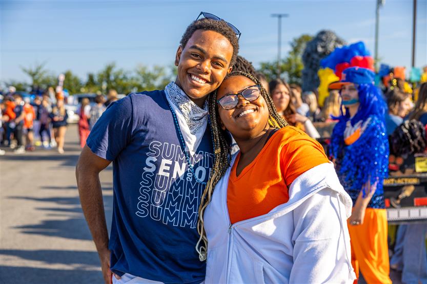 Students at the Summit High homecoming parade